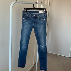 Rag and bone jeans with distressed trim and knees.